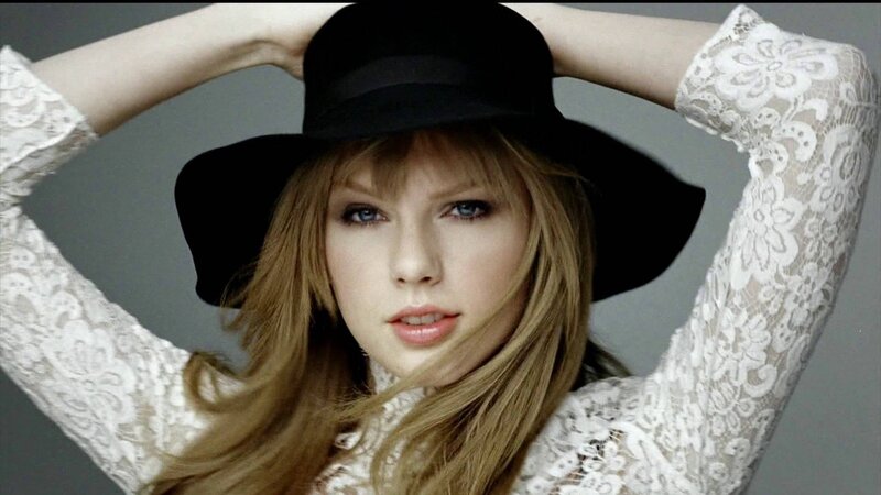 woman in black hat and lace