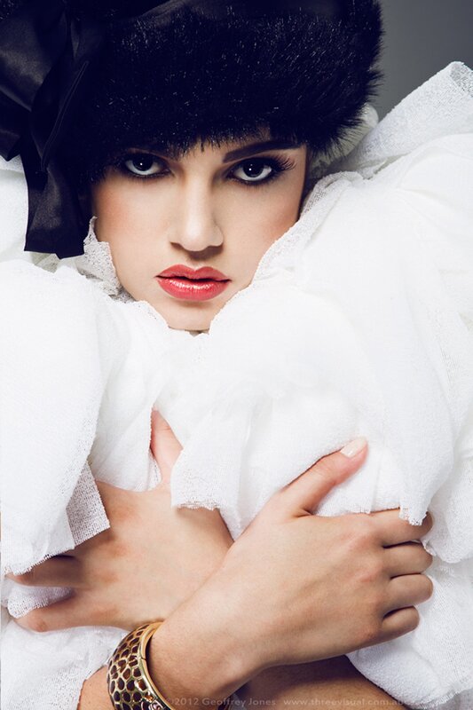 woman in black hat and white garment
