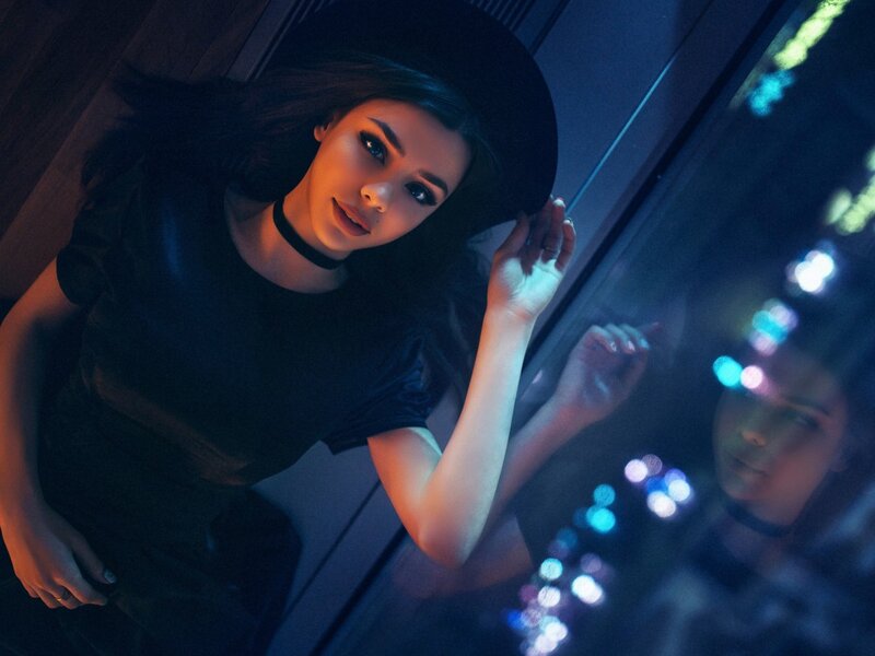 Woman in Black Hat — Blue, Dramatic, Night