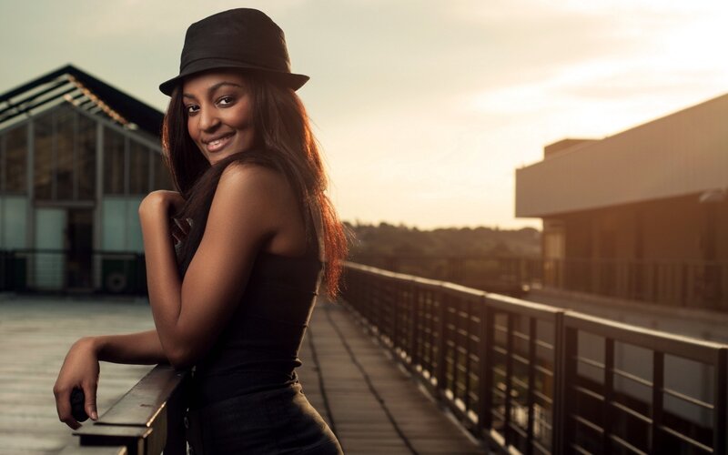 Woman in Black Hat — Calm, Sunset