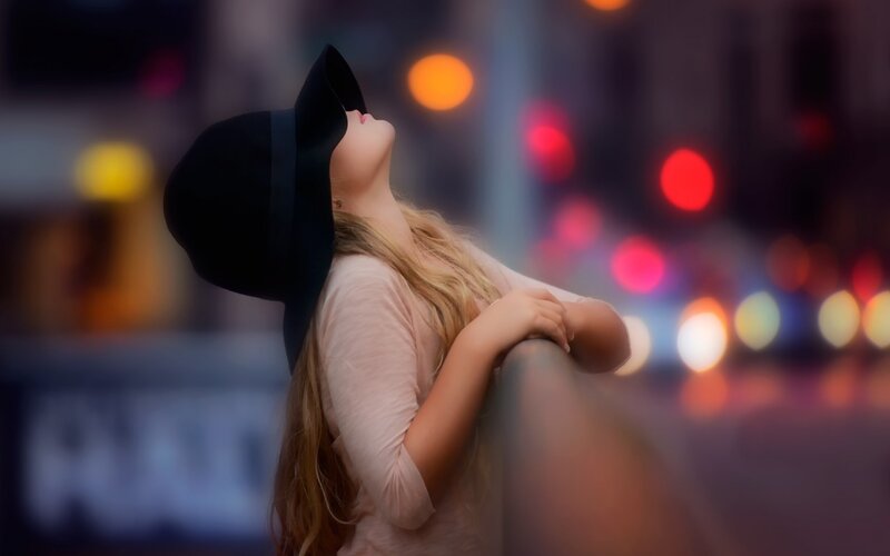 Woman in Black Hat — Contemplative, Night