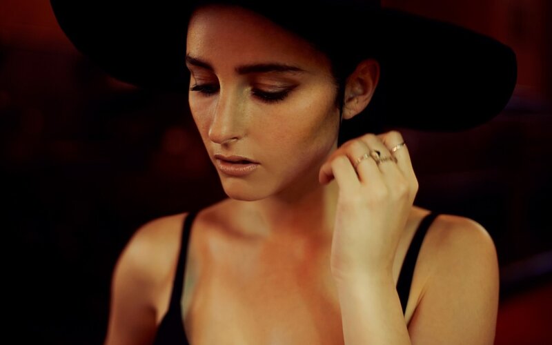 Woman in Black Hat — Dramatic, Night, Photograph, Rings