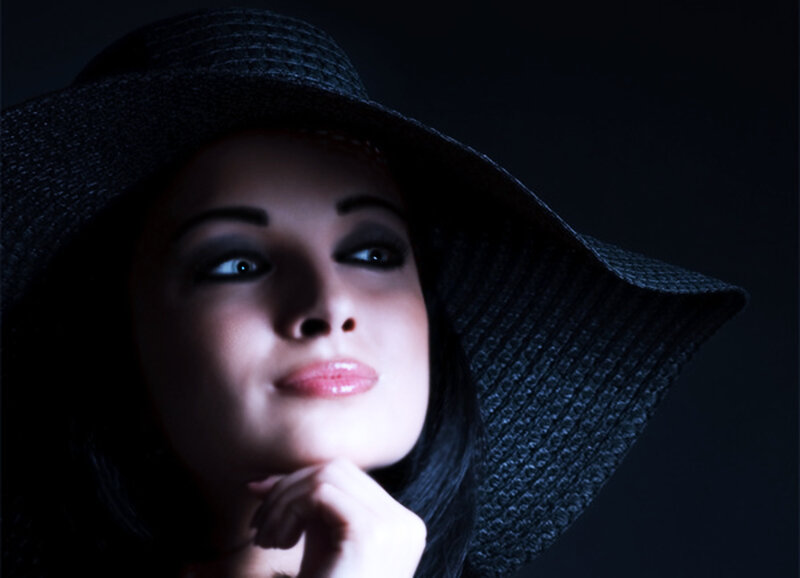 Woman in Black Hat — Dramatic, Night, Photograph
