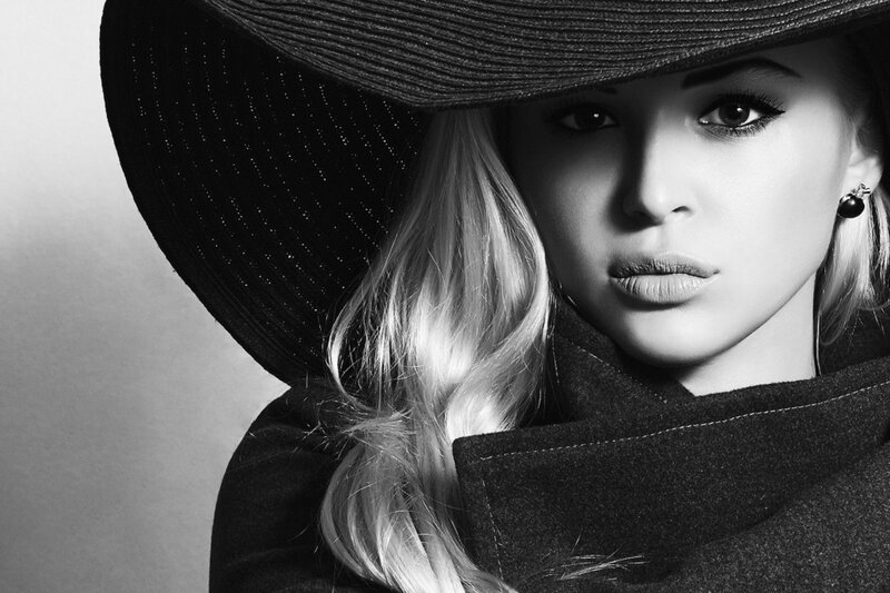 Woman in Black Hat — Dramatic, Photograph, Coat, Earring