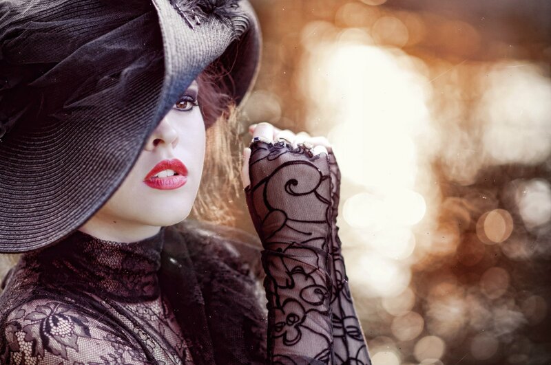 Woman in Black Hat — Dramatic, Sunset, Photograph, Gloves