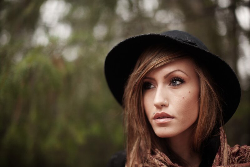 woman in black hat outdoors