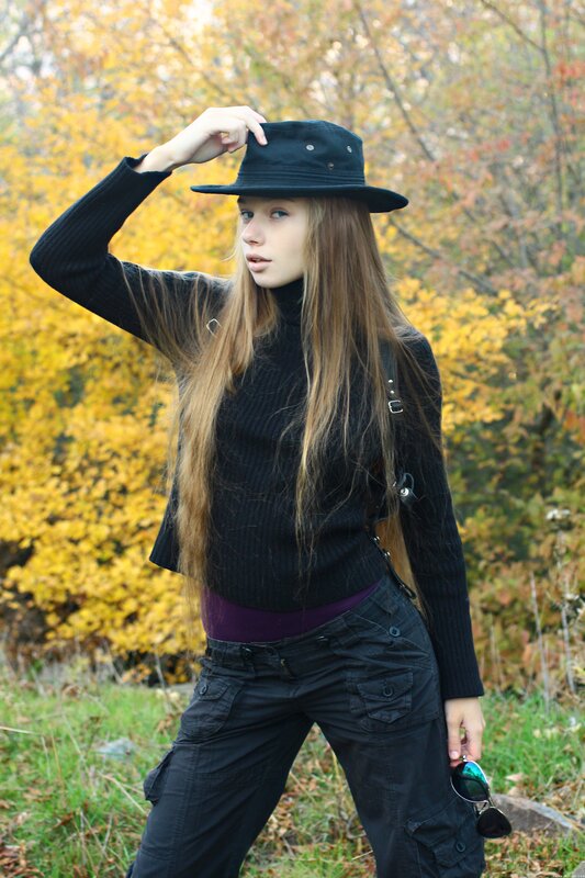 woman in black hat outdoors