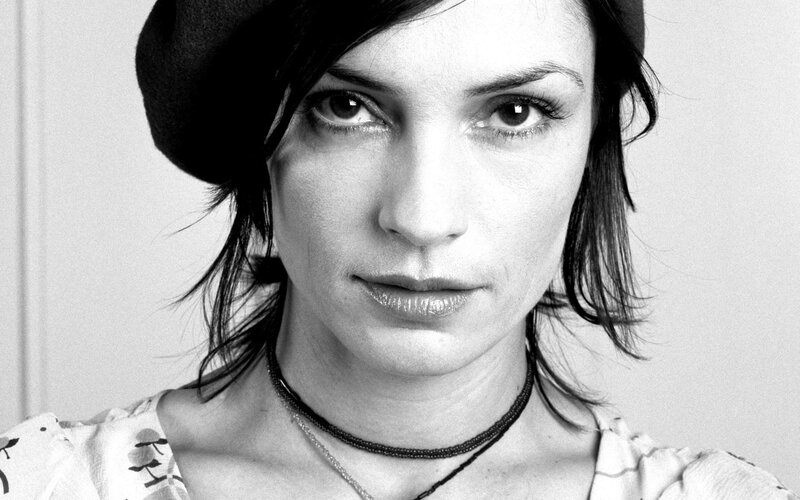 woman in black hat portrait
