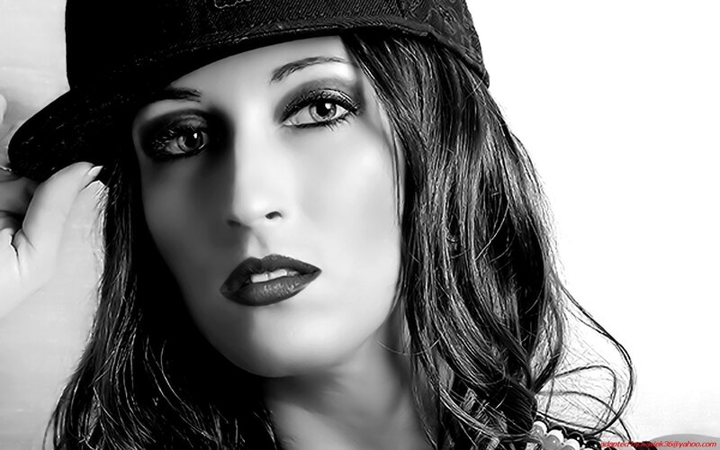 woman in black hat portrait