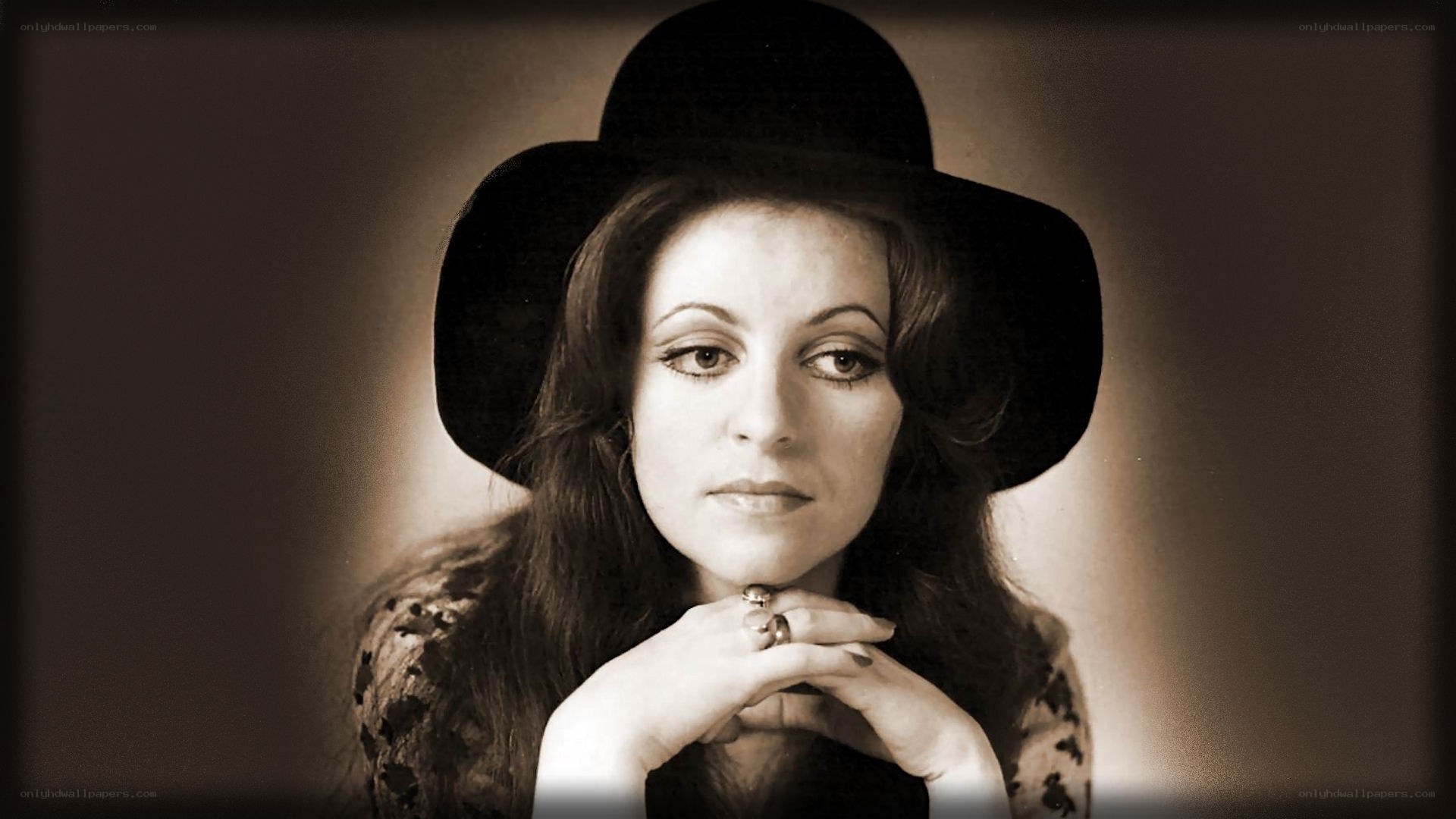 woman in black hat portrait