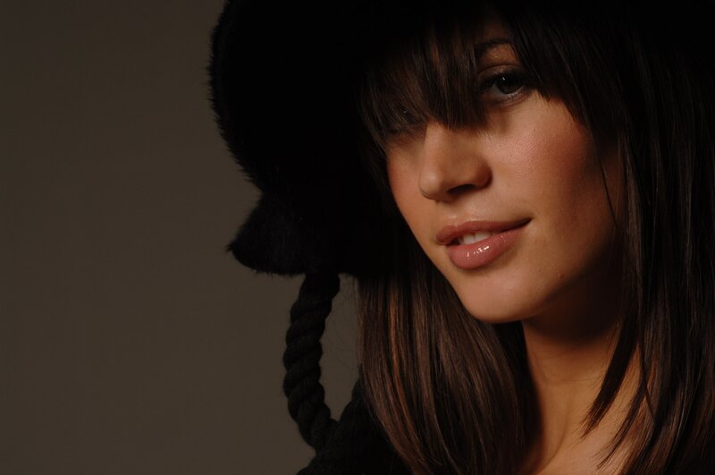 woman in black hat portrait
