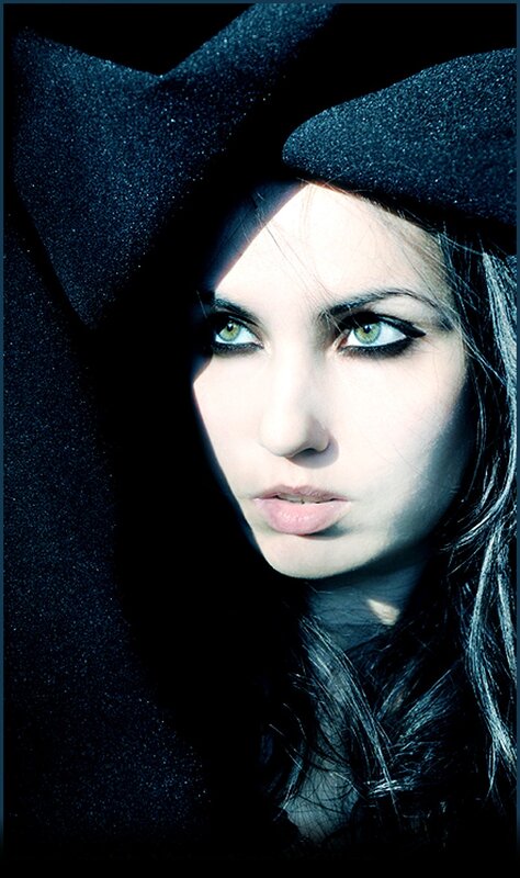 woman in black hat portrait