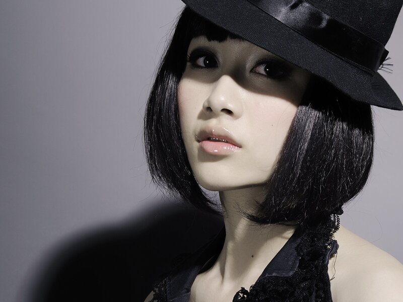 woman in black hat portrait