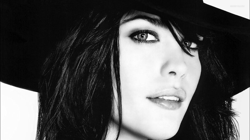 woman in black hat portrait