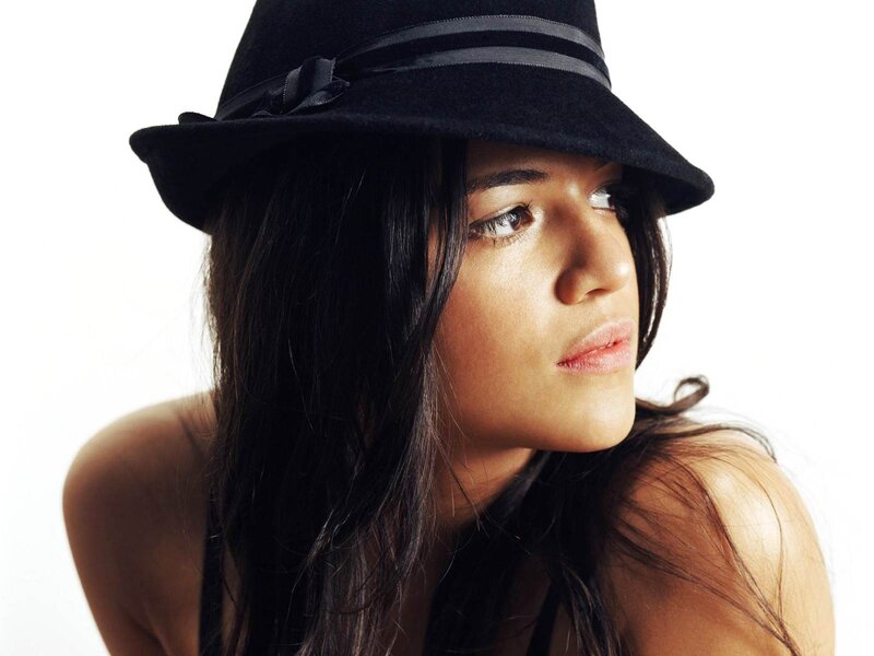 woman in black hat portrait