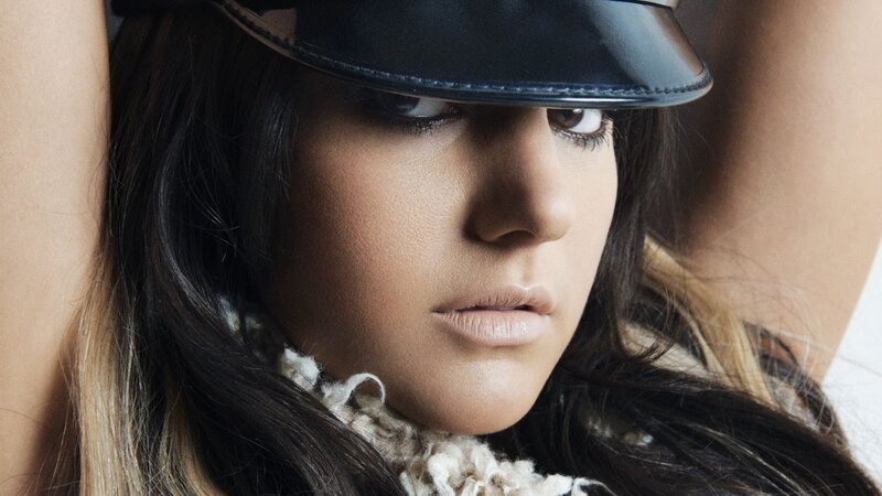woman in black hat portrait