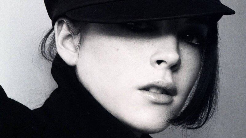 woman in black hat portrait