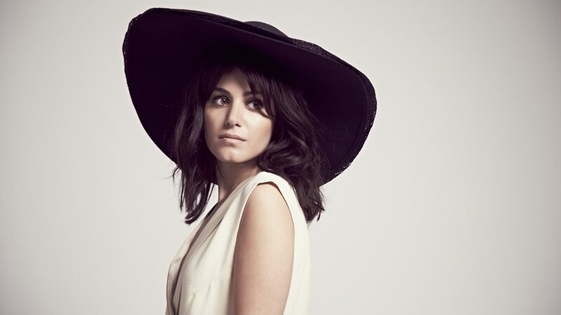 woman in black hat portrait