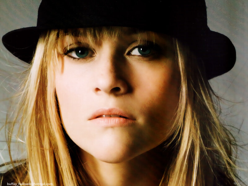 woman in black hat portrait