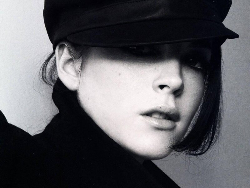 woman in black hat portrait
