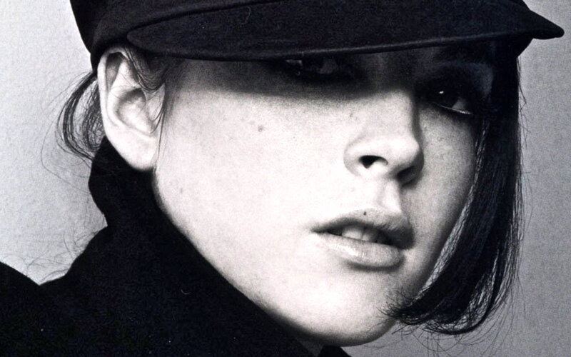 woman in black hat portrait