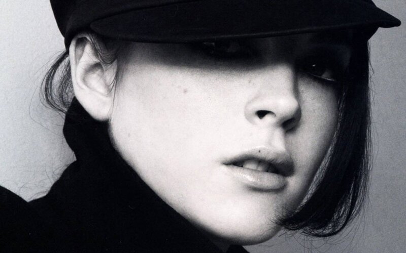 woman in black hat portrait