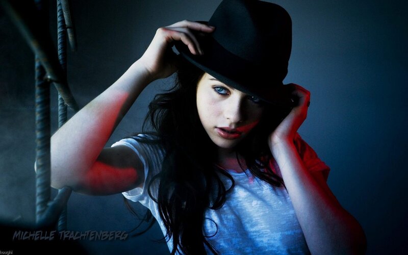 woman in black hat portrait