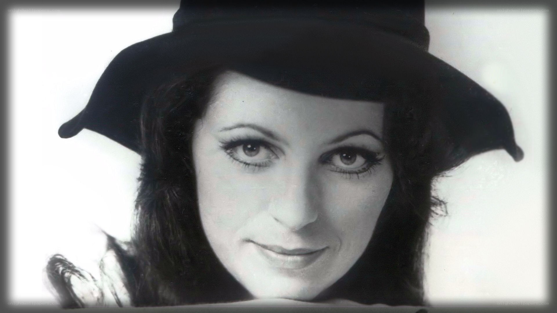 woman in black hat portrait