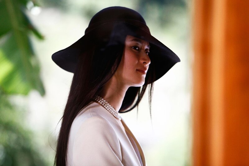 Woman in Black Hat — Serene