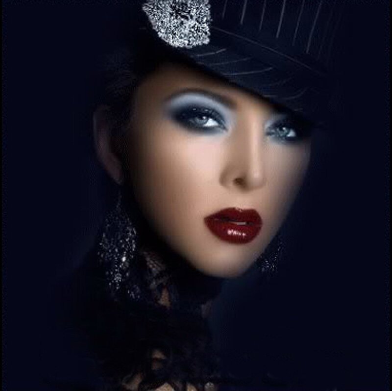 woman in black hat with dramatic makeup