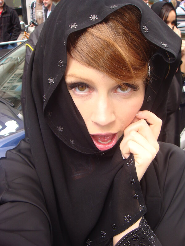 woman in black headscarf