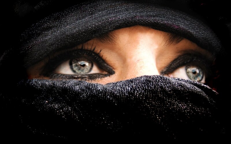 woman in black headscarf