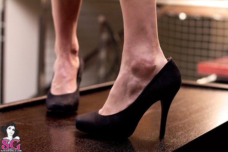 woman in black high heels