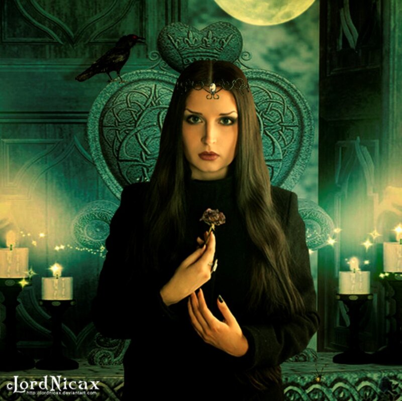 Woman in Black Holding Flower