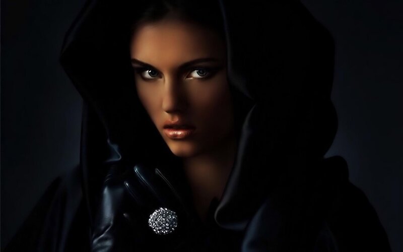 woman in black hood