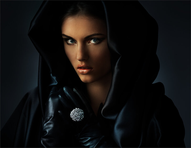 Woman in Black Hood — Dramatic