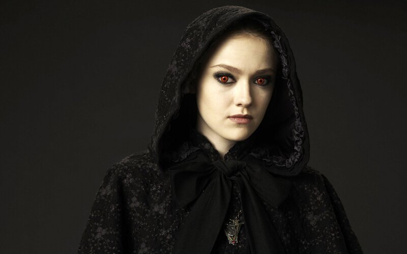 woman in black hooded cloak