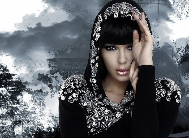 Woman in Black Hooded Garment — Dramatic