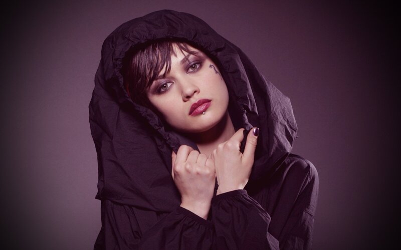 woman in black hooded jacket