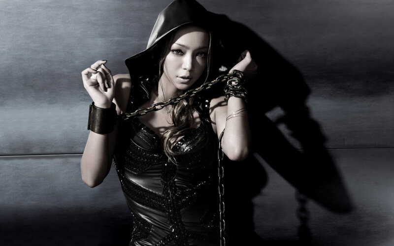 Woman in Black Hooded Outfit — Dramatic, Photograph, Chain