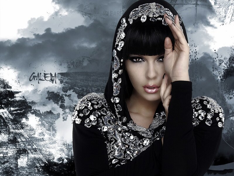Woman in Black Hooded Outfit — Dramatic
