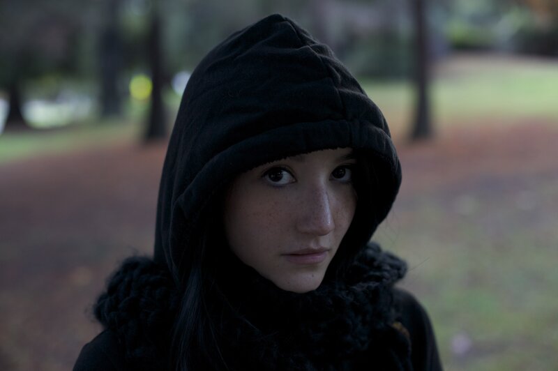 woman in black hoodie