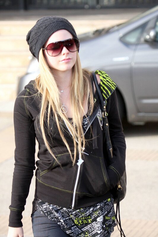 woman in black hoodie and beanie