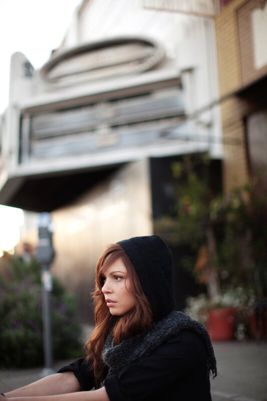 woman in black hoodie on street