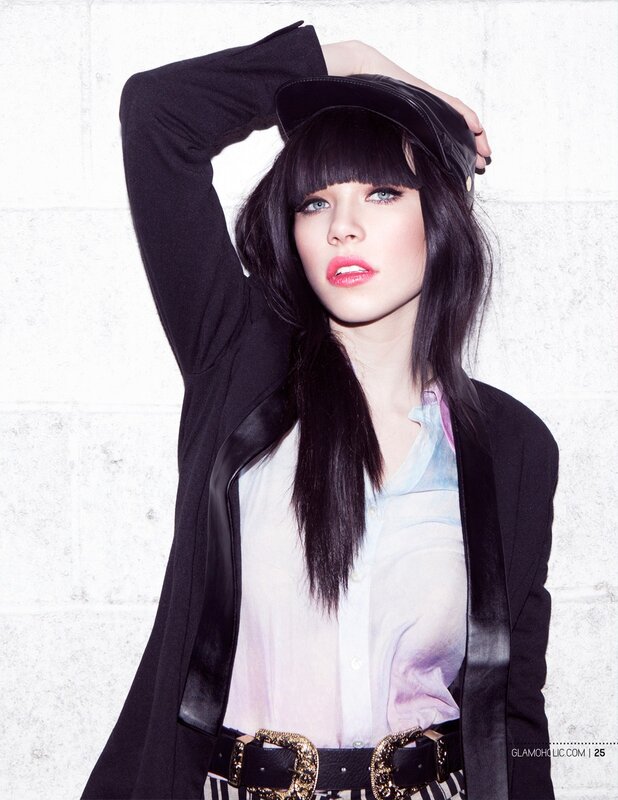 woman in black jacket and cap