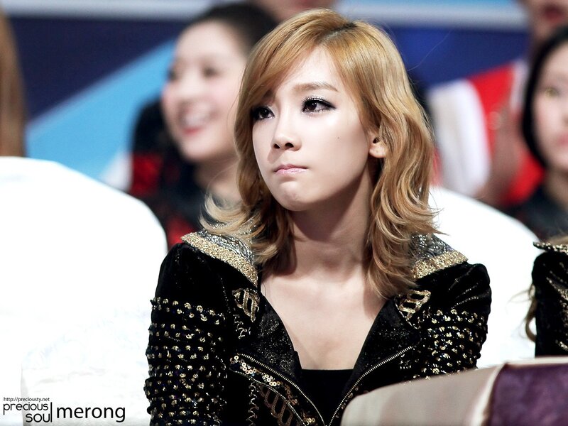 woman in black jacket at event