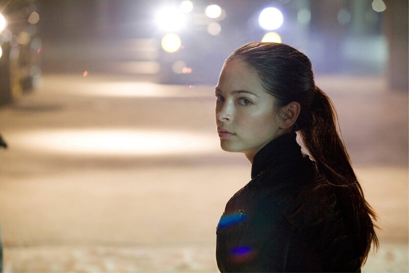 woman in black jacket at night