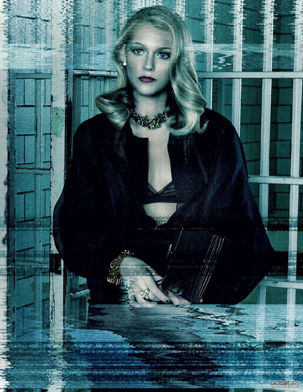 woman in black jacket behind bars