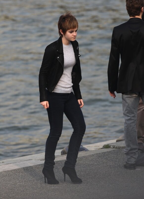 woman in black jacket by water