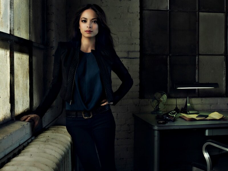 Woman in Black Jacket — Dramatic, Night, Photograph, Desk